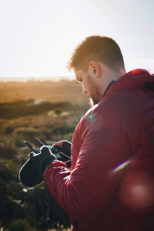 photographer, camera, photography, lens, man, digital, male, reporter, paparazzi, journalist, hobby, shot, photographing, picture, focus,drone,controller,joystick,fun,have fun,having fun,happy,colorful,red