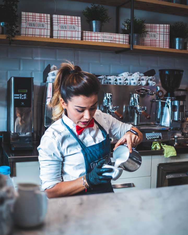business, bar, espresso, coffee, barista, restaurant, cafe, cup, worker, people, preparation, drink, machine, work, service, cafeteria, shop, counter, maker, prepare, professional, holding, owner, staff, occupation, man, employee, apron, mill, pouring, indoors, steam, hand, make, waiter, woman, job, industry, attractive, uniform, person, making, tool, day, employer, appliance, portafilter, mug, cappuccino, caffeine