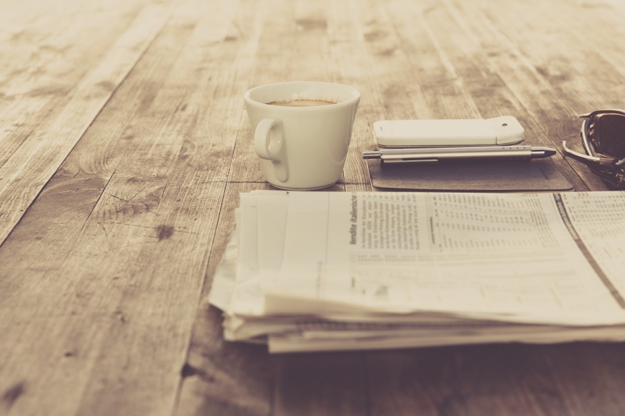 table, cell, daily newspaper, coffee, coffee, pen,