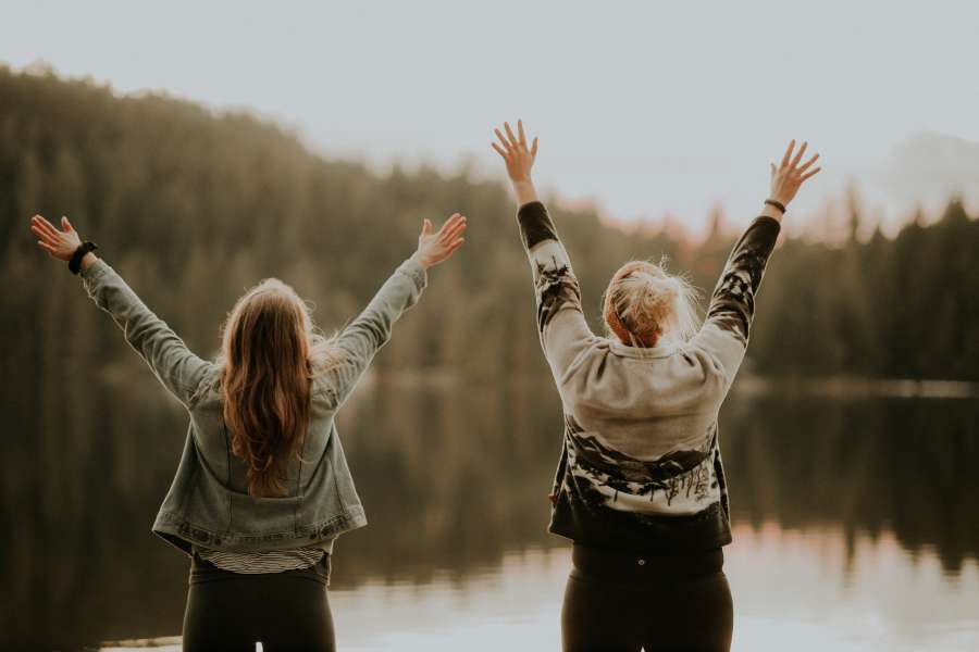 woman, women, friends, friendship, day, lagoon, lake, winter, two people, raising arms, joy, happiness, feminine power, vacation, travel, nature, exterior, adventure, arrive, success,
