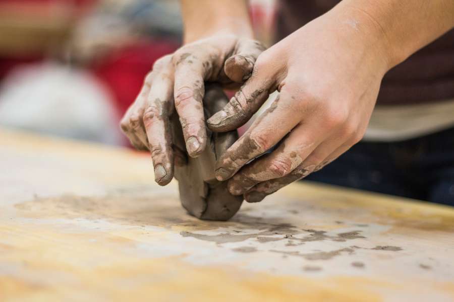 clay, ceramic, hands, one person, activity, work, mud, mold, molding, table, shape, dirty, art, craftsman,