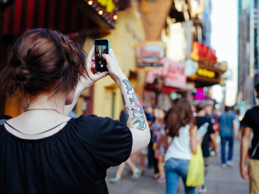 one person, people, woman, tattoo, cellular phone, smartphone, photography, city, travel, travel, young, 20 years, back view, urban, street,