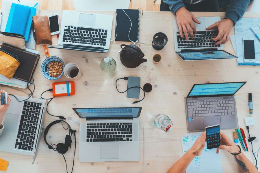computer, work, laptop, computer, desk, coworking, overhead view, office, technology, people, working, work, workgroup, group of people,