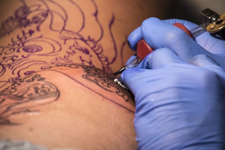 adults  alternative  artists  black  body  body drawing  client  color  create  creative  culture  design  drawing  fashion  gloves  hand  ink  lifestyle  machine  man  master  needle  process  professional  skin  sterile  studio  tattoo  tattoo artist  tool  work