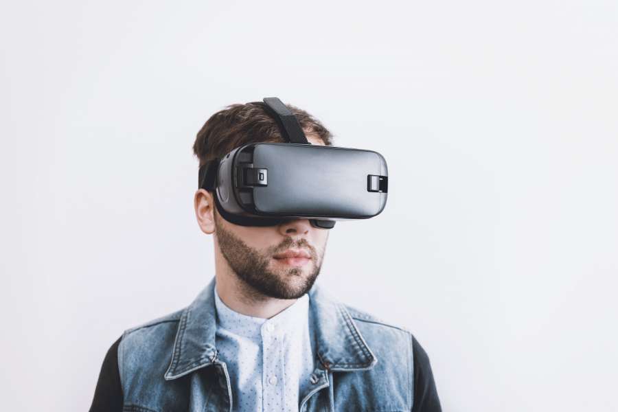 man, male, technology, futuristic, using, reality, device, vr, 3d, headset, virtual, young, equipment, glasses, adult, goggles, gesturing, profession, entertainment, professional, occupation, casual, career, pointing, business, digital, corporate, lifestyle, day, workplace, indoors, clothing, game, innovation, sitting, smart, virtual reality, contemporary, immersive, gaming, one, gadget, classy, elegant, leisure, bureau, length, wearing, blue, focused, people, hi-tech, home, video, boy, cyberspace, modern, person, eyewear, office, confident, interacting, 40s, wireless technology, play, 40-44 years, mature adult, enjoyment, experience, wearable computer, caucasian ethnicity, mature men, business person, wristwatch, cut out, virtual reality simulator, visual, though, men, control, gentleman, evening, cyber, light, well dressed, japanese, chinese, red, wearable, night, look, joystick, remote, single, gamer, cardboard, hand, three, computing, interior, studio, quarter, smiling, lmobile, wireless, fun, half, playing, indoor, room, vision, science, gesture, simulation, expression, floor, gray, amazed, 20s, black hair, wall, future, guy, against, tech, videogame, interactive, enjoying, leaning, handsome, looking, creative business