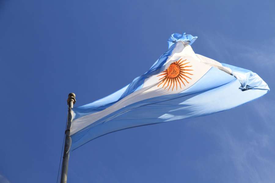 argentina, flag, patriotism, symbol, waving, sky, national, blue, wind, country, pole, white, patriotic, outdoors, background, nation, independence, outdoor, government, culture, emblem, argentinian, sign, politics, state, identity, cloud, travel, horizontal, sunlight, liberty, fourth, united, sun, nobody, symbolic, blowing, argentina flag