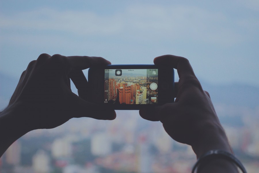 cityscape, one person, people, man, hand, hands, cell, telephone, mobile, photo, taking, blur, concept, technology, buildings, phone, 