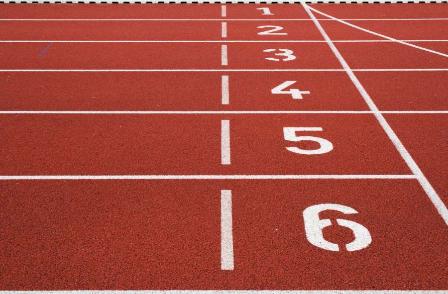 track, stadium, start, field, athletic, race, line, sport, competition, run, red, racetrack, success, sprint, healthy, outdoor, empty, speed, background, running, athlete, ground, training, path, event, concept, contest, green, texture, grass, compete, white, health, lane, fast, pattern, sky, runner, exercise, number, win, sun, nobody, striped, school, male, finish, motion, arena, fitness