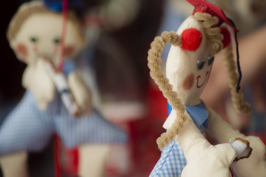 Close-up, color, day, focus foreground,Toy, children, graduates, doll, childhood, photograph, Human representation, still life, colors, souvenir, rag doll, rag doll, small, childhood