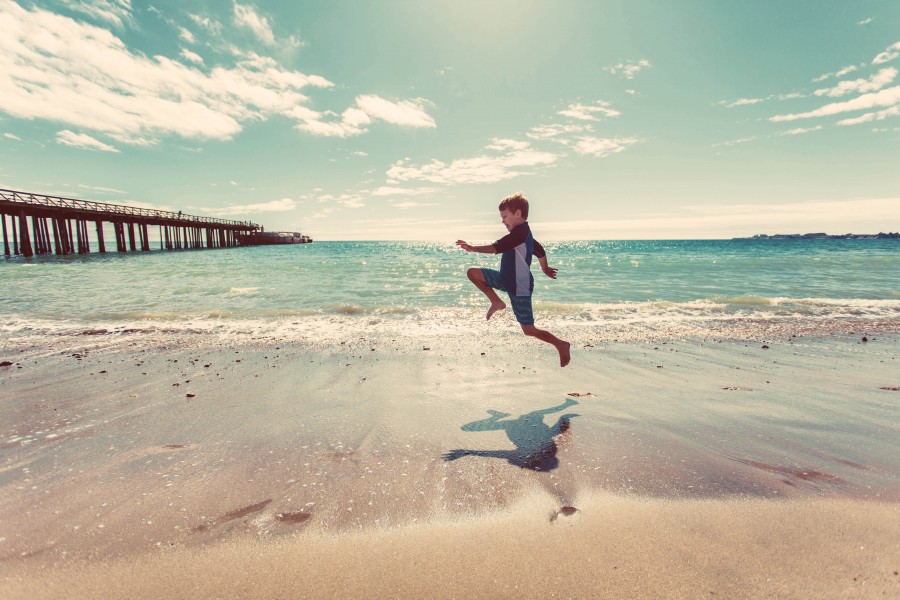 one person, people, boy, playing, playing, beach, coast, jump, joy, childhood, vacation, 5 years, jumping, shadow, happyness, 