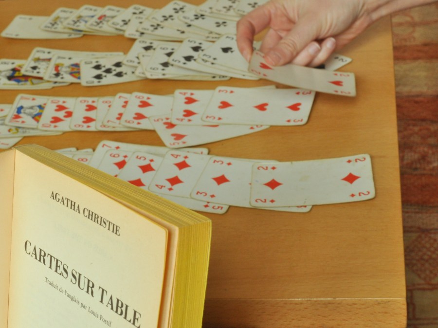 one person, woman, hand, play, playing, card, cards, card, cards, hearts, solitaire, playing, table, interior, board game,